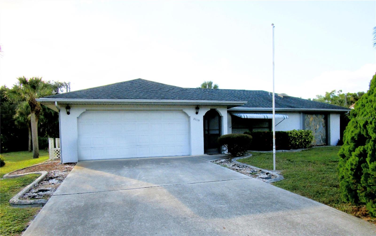 Single Family Residence em PORT CHARLOTTE, FL - Daniel Dourado