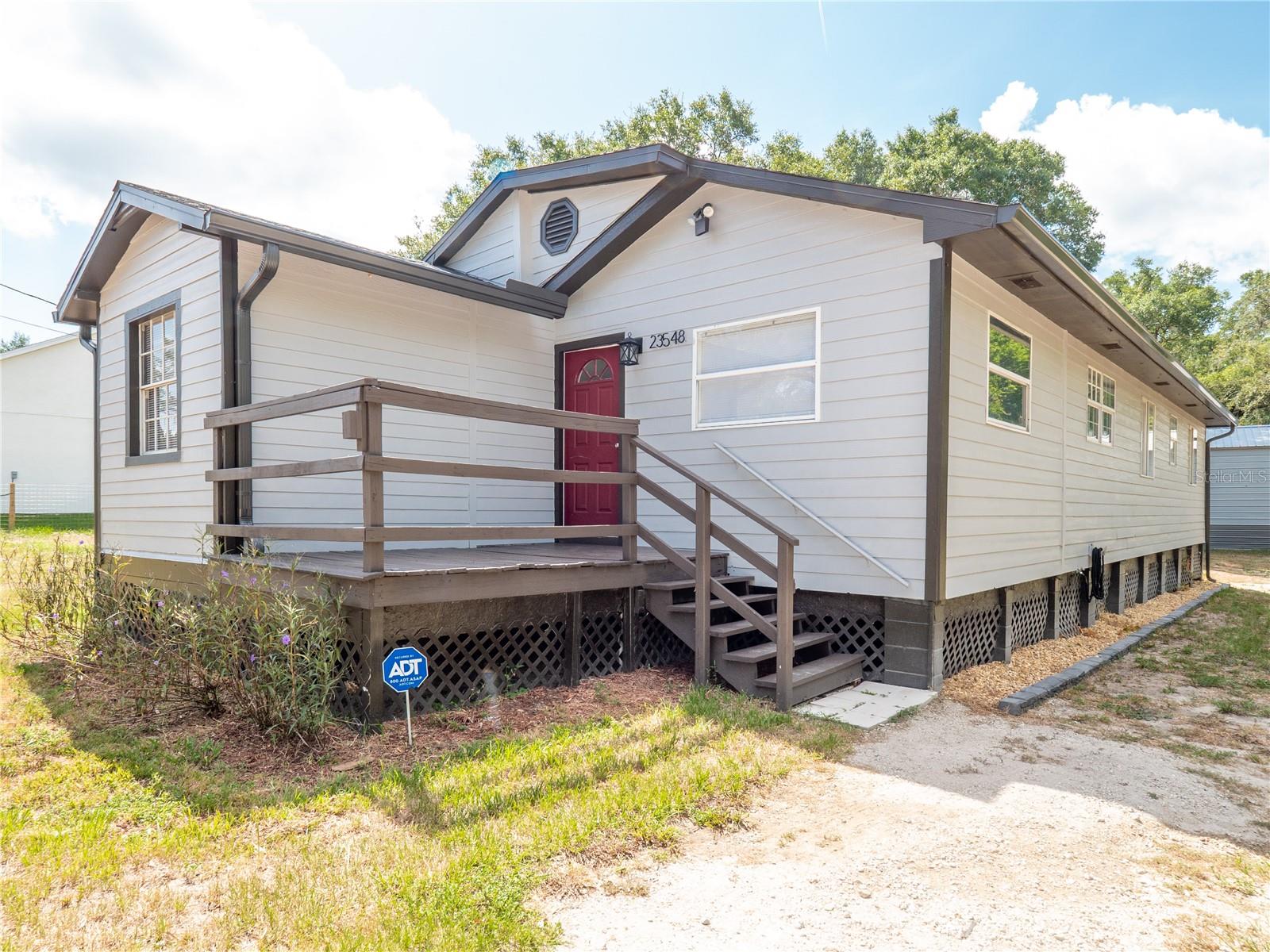 Single Family Residence em SORRENTO, FL - Daniel Dourado