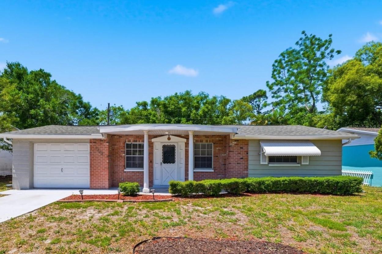 Single Family Residence em HOLIDAY, FL - Daniel Dourado