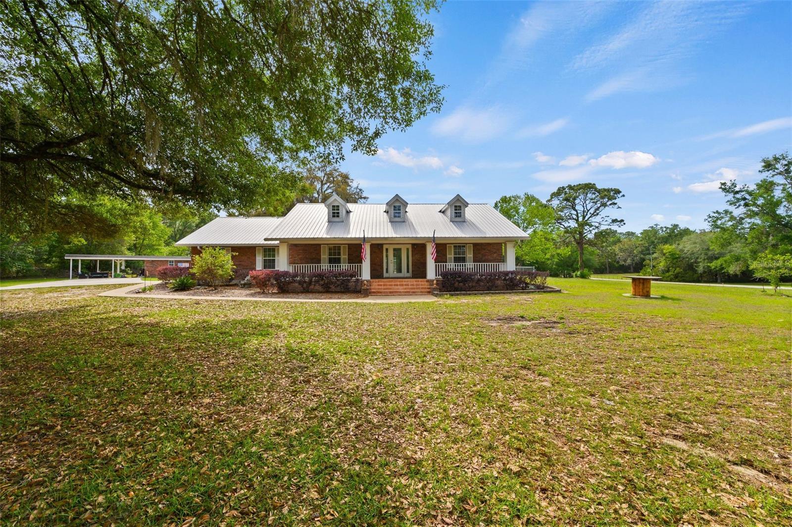 Single Family Residence em NEWBERRY, FL - Daniel Dourado