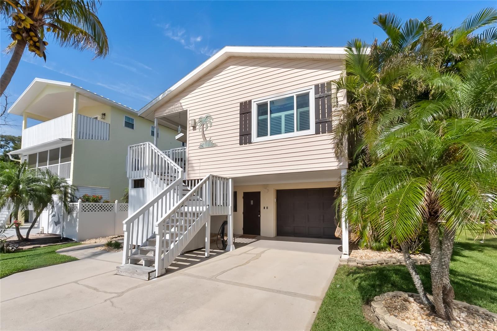 Single Family Residence em HOLMES BEACH, FL - Daniel Dourado