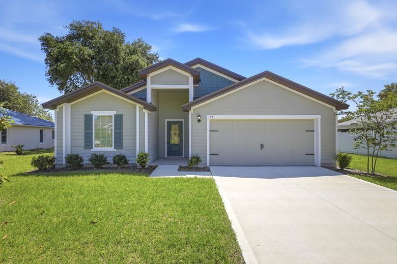 Single Family Residence in PALM COAST, FL - Daniel Dourado