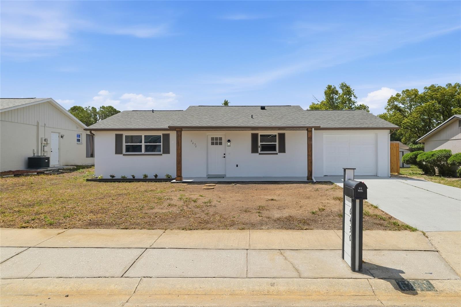Single Family Residence in NEW PORT RICHEY, FL - Daniel Dourado