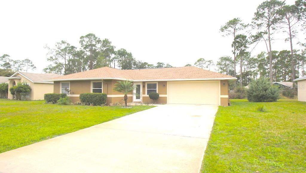 Single Family Residence in PALM COAST, FL - Daniel Dourado