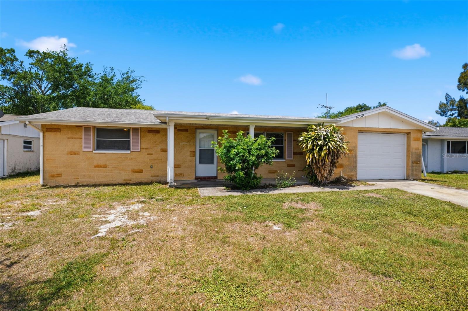 Single Family Residence in PORT RICHEY, FL - Daniel Dourado