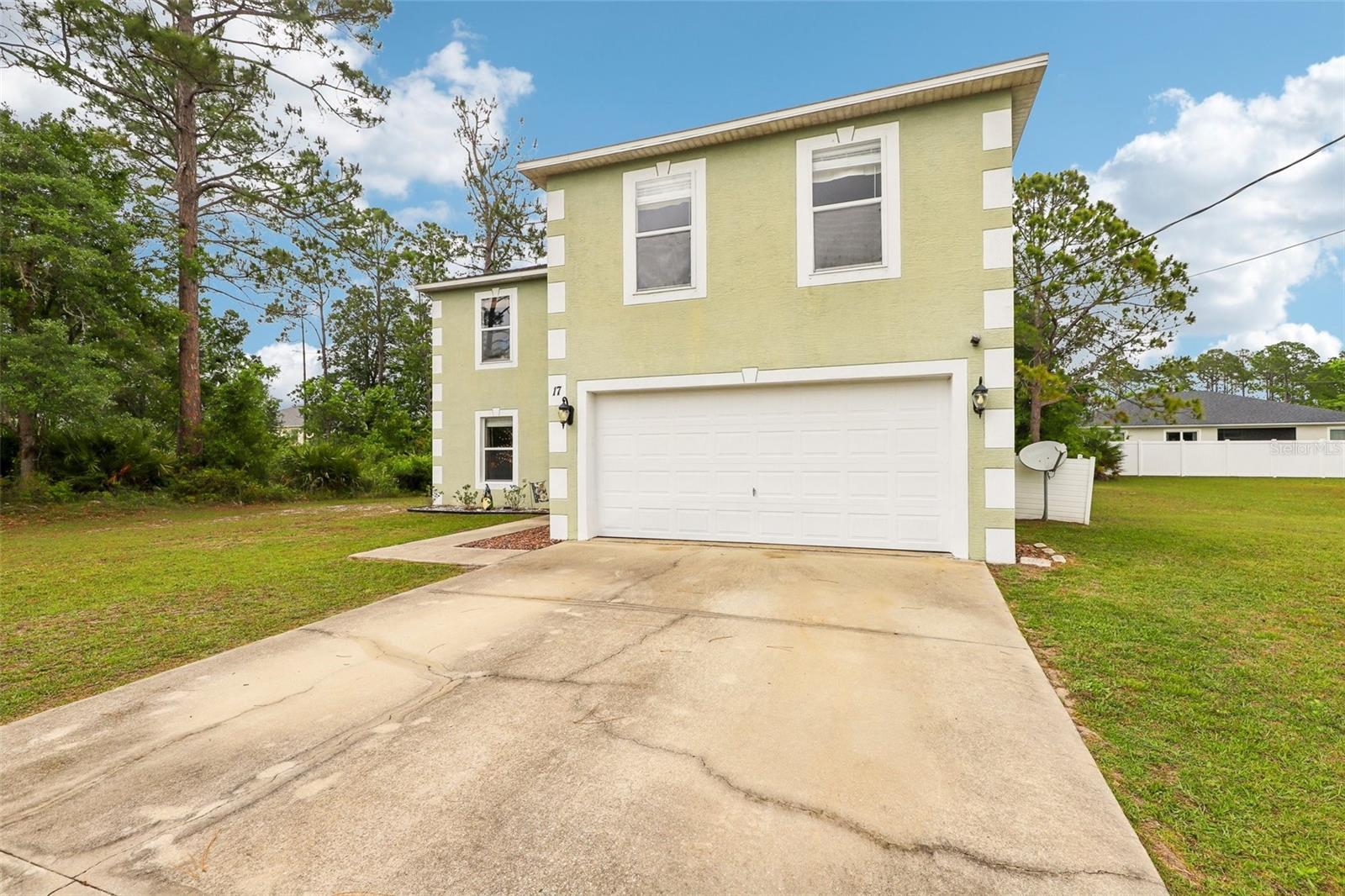 Single Family Residence in PALM COAST, FL - Daniel Dourado