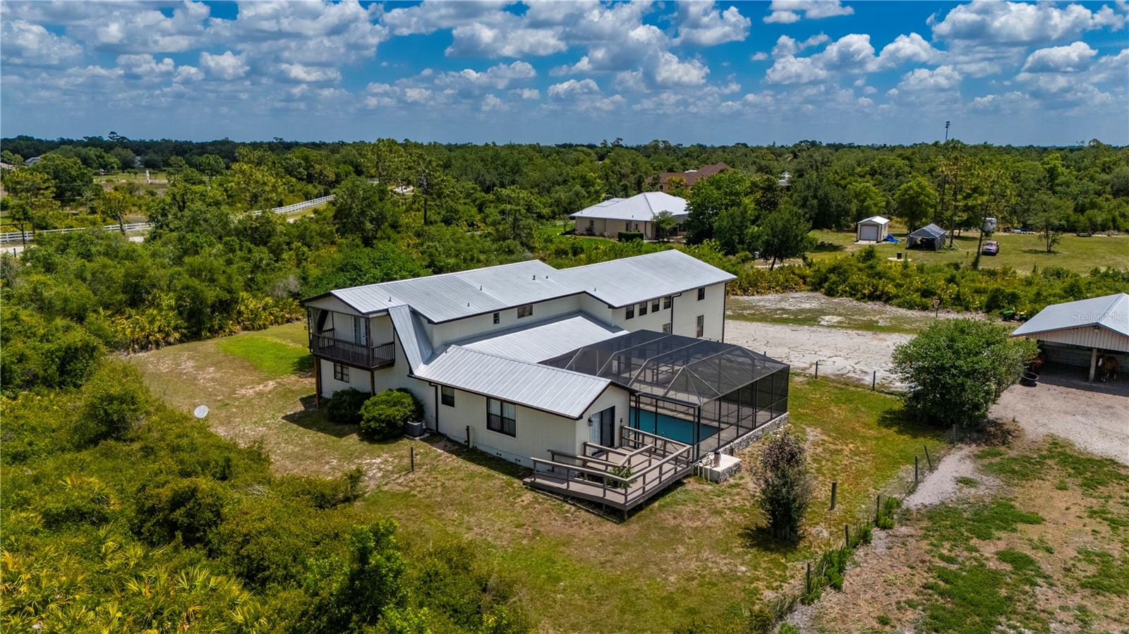Single Family Residence em PUNTA GORDA, FL - Daniel Dourado