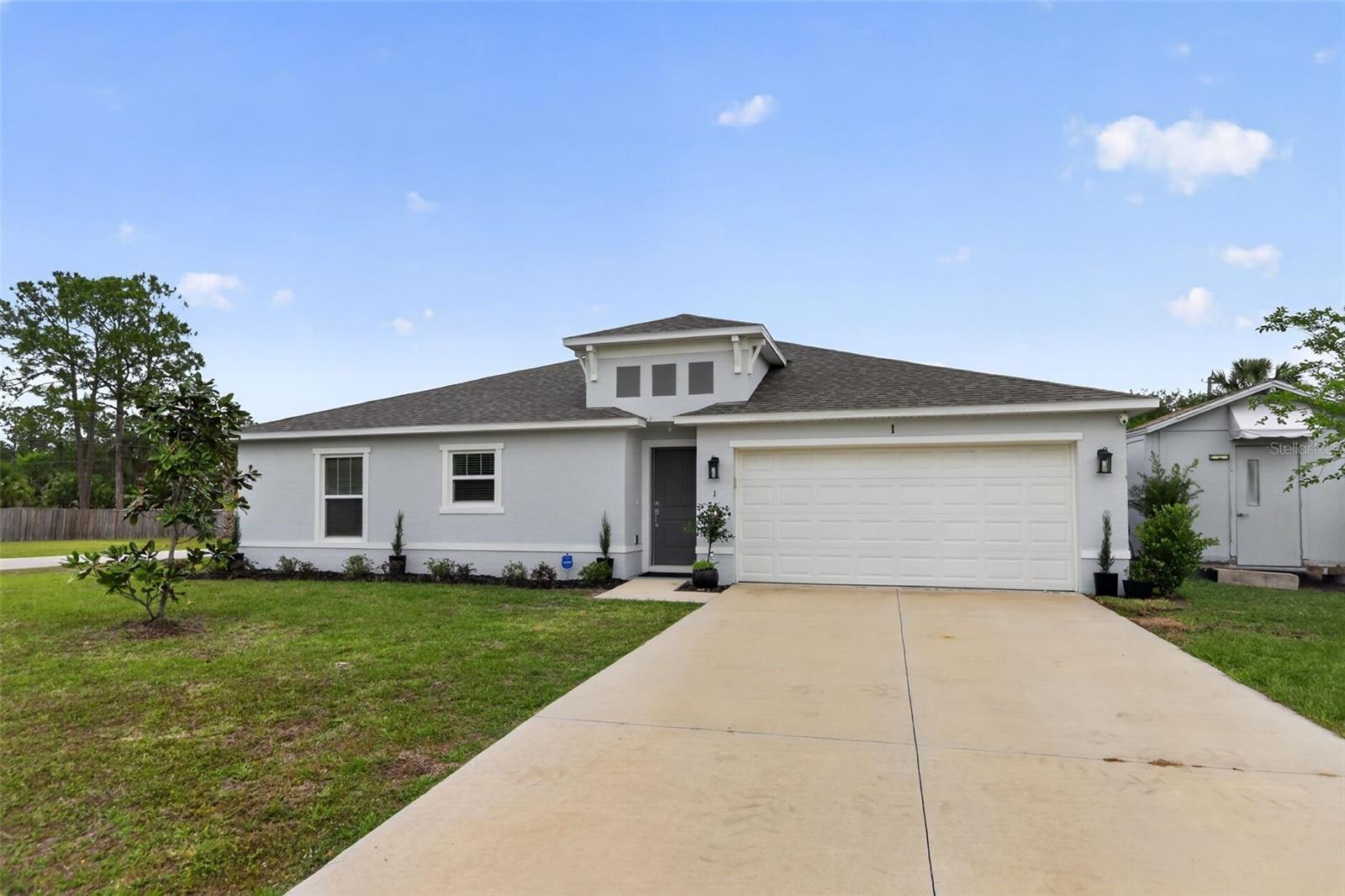 Single Family Residence in PALM COAST, FL - Daniel Dourado