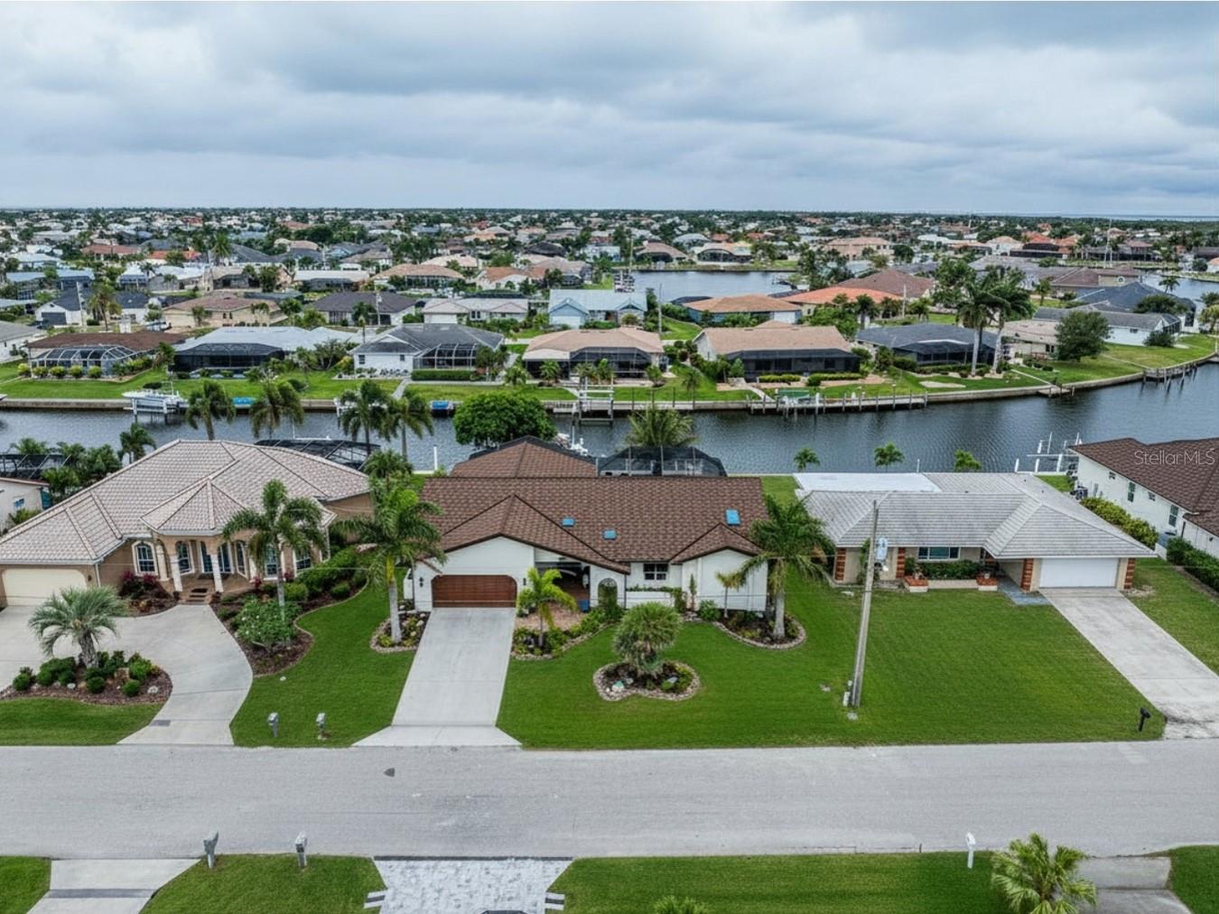 Single Family Residence em PUNTA GORDA, FL - Daniel Dourado