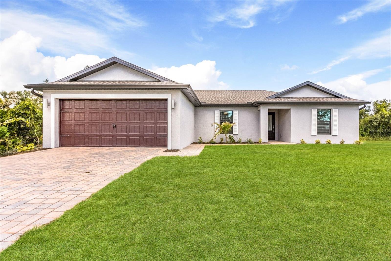 Single Family Residence in PORT CHARLOTTE, FL - Daniel Dourado