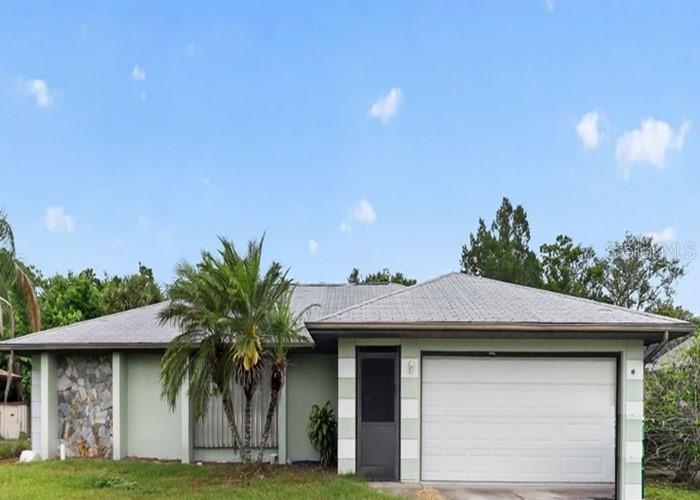 Single Family Residence in PORT CHARLOTTE, FL - Daniel Dourado