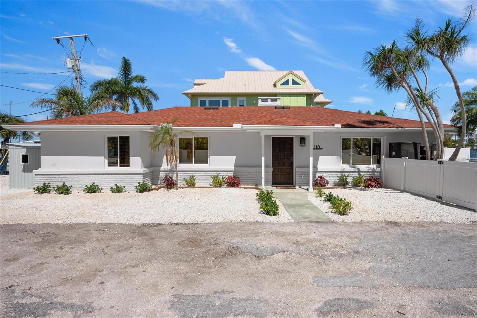 Single Family Residence in BRADENTON BEACH, FL - Daniel Dourado