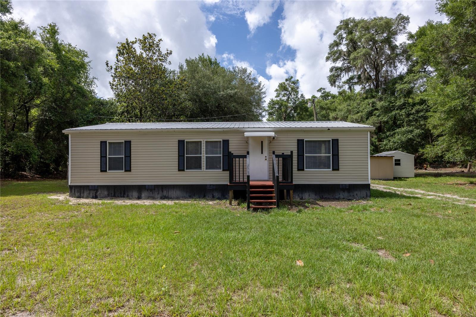 Single Family Residence in CHIEFLAND, FL - Daniel Dourado