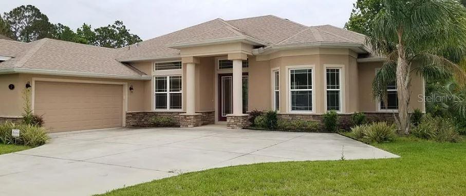 Single Family Residence in PALM COAST, FL - Daniel Dourado