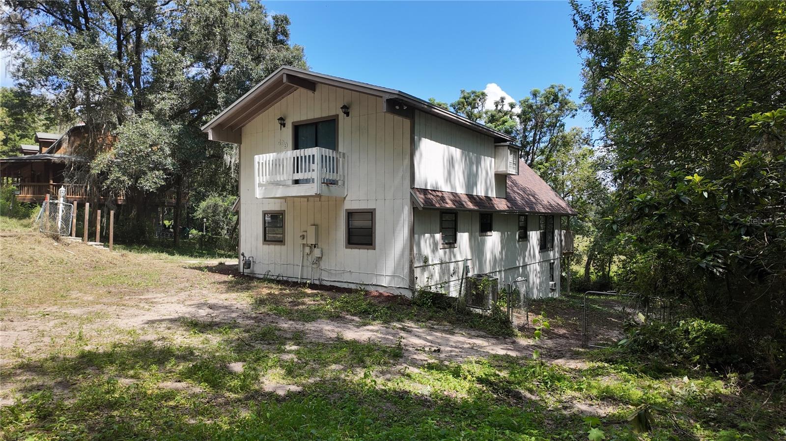 Single Family Residence em FRUITLAND PARK, FL - Daniel Dourado