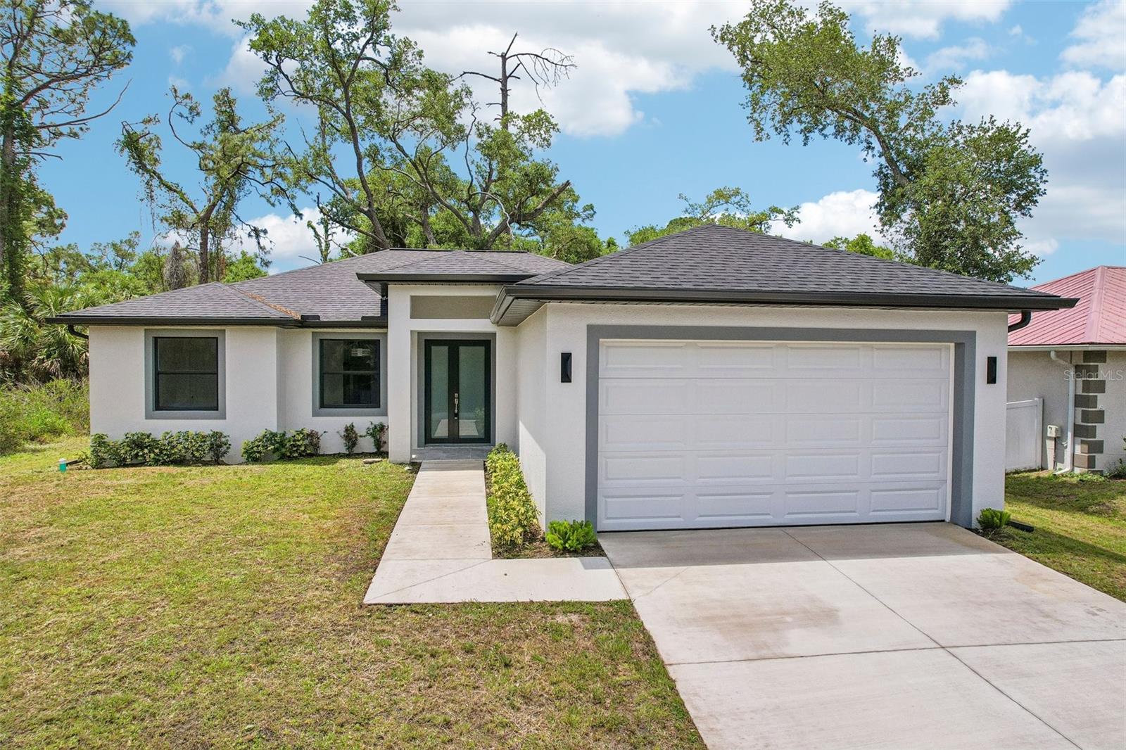 Single Family Residence in PORT CHARLOTTE, FL - Daniel Dourado