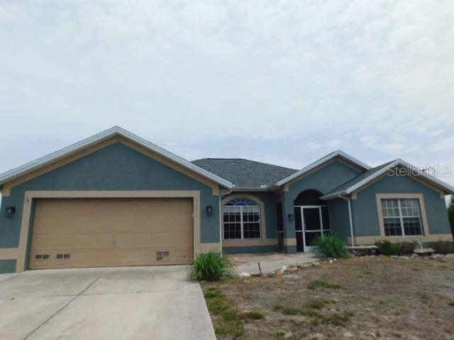 Single Family Residence in PORT CHARLOTTE, FL - Daniel Dourado