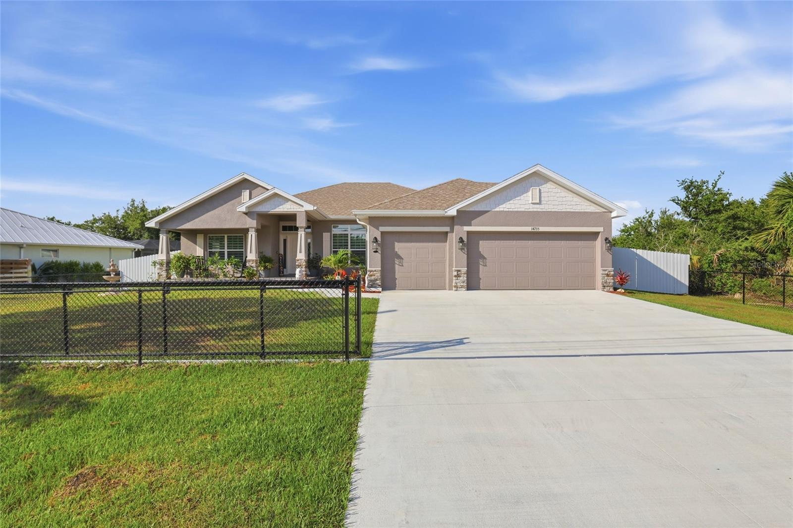 Single Family Residence in PORT CHARLOTTE, FL - Daniel Dourado