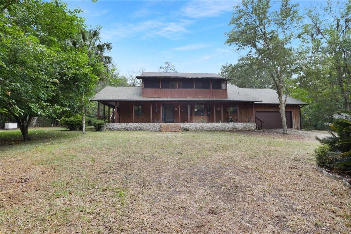 Single Family Residence em MICANOPY, FL - Daniel Dourado