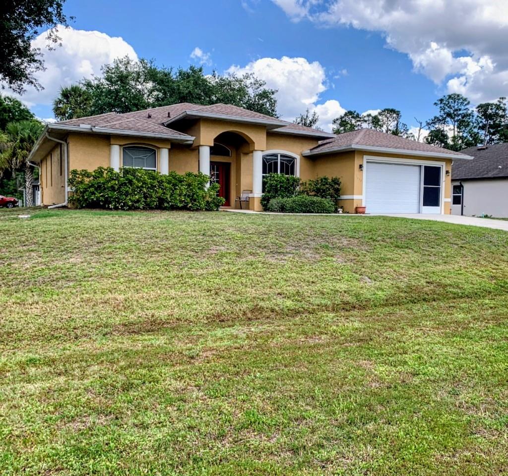Single Family Residence em NORTH PORT, FL - Daniel Dourado