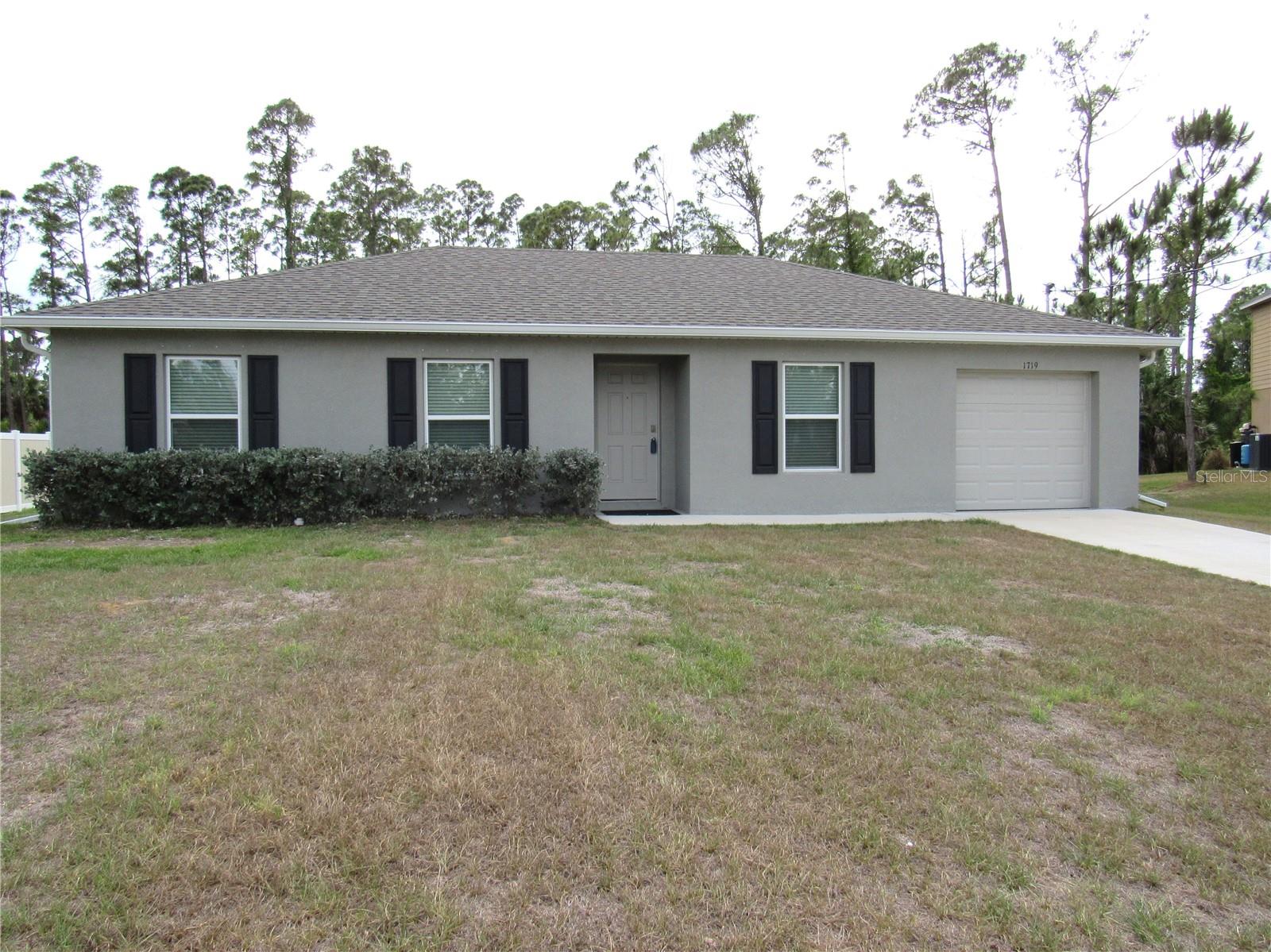 Single Family Residence em NORTH PORT, FL - Daniel Dourado