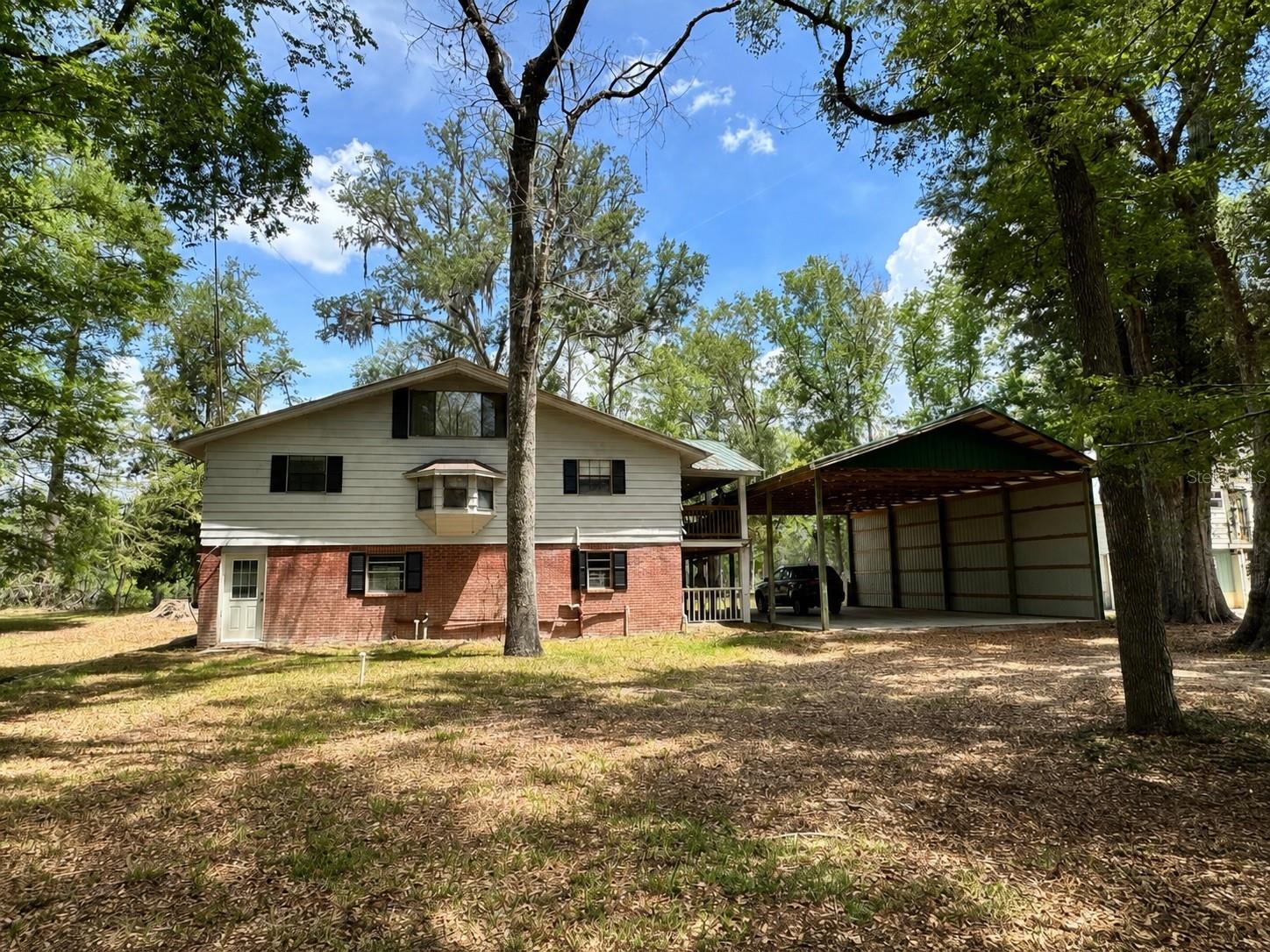 Single Family Residence in OLD TOWN, FL - Daniel Dourado
