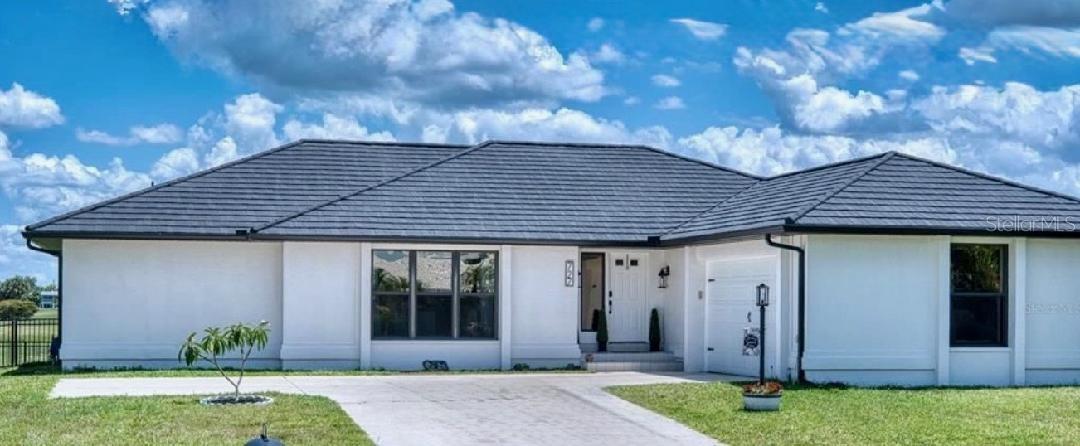 Single Family Residence in PUNTA GORDA, FL - Daniel Dourado
