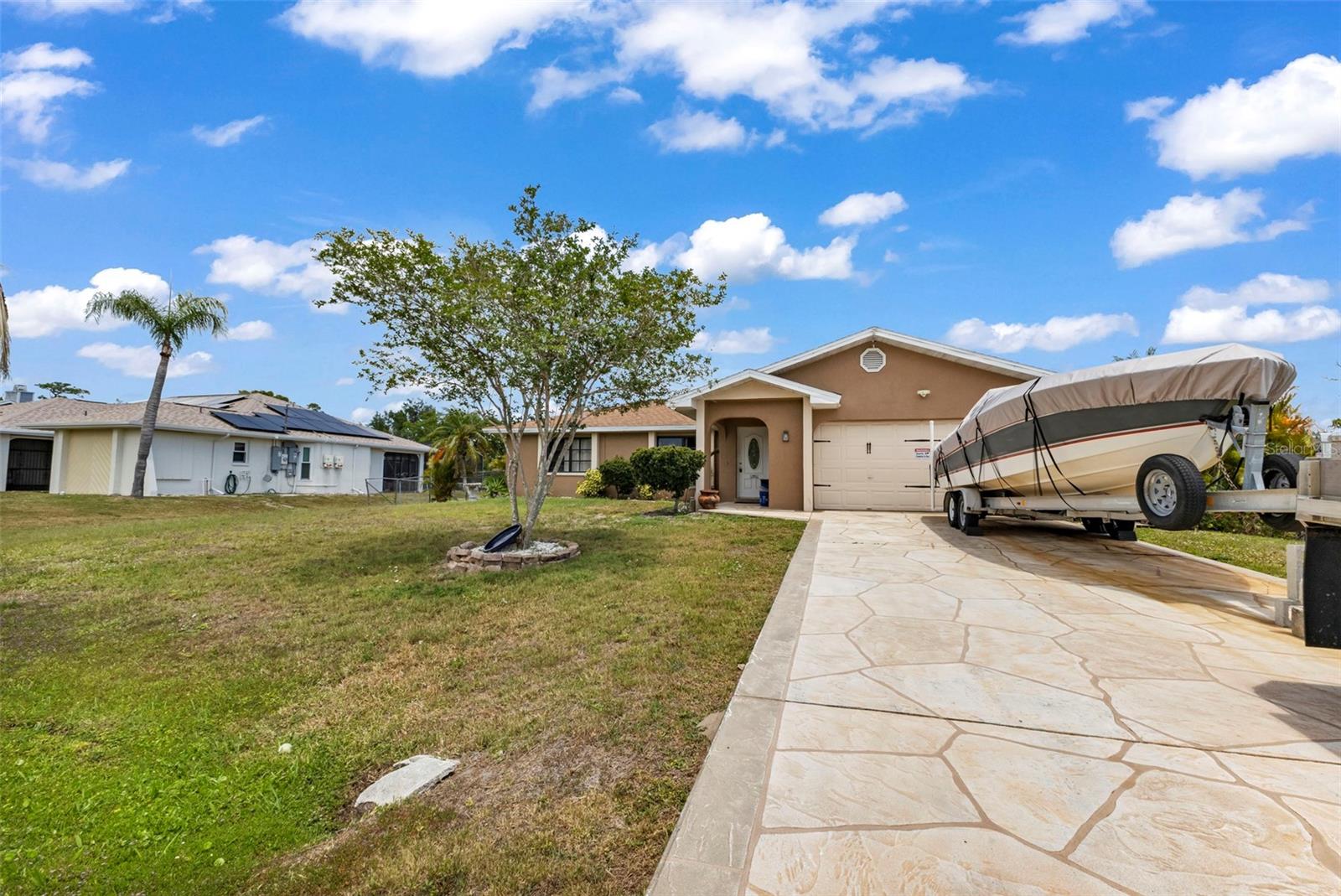 Single Family Residence in PORT CHARLOTTE, FL - Daniel Dourado
