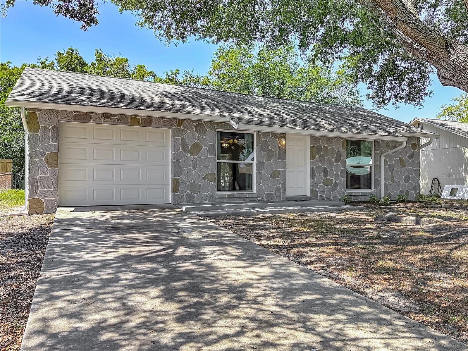 Single Family Residence in NEW PORT RICHEY, FL - Daniel Dourado
