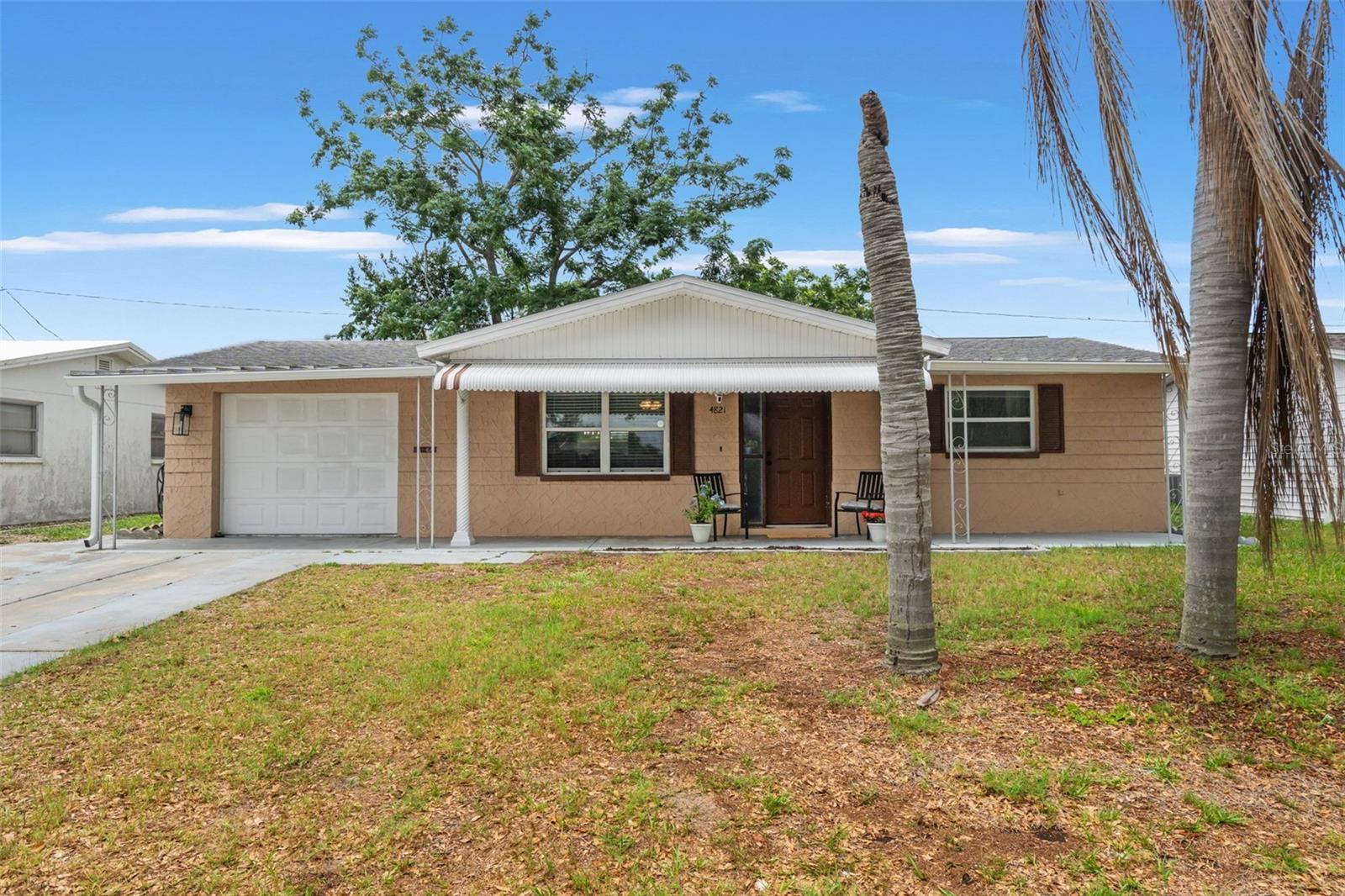 Single Family Residence in NEW PORT RICHEY, FL - Daniel Dourado