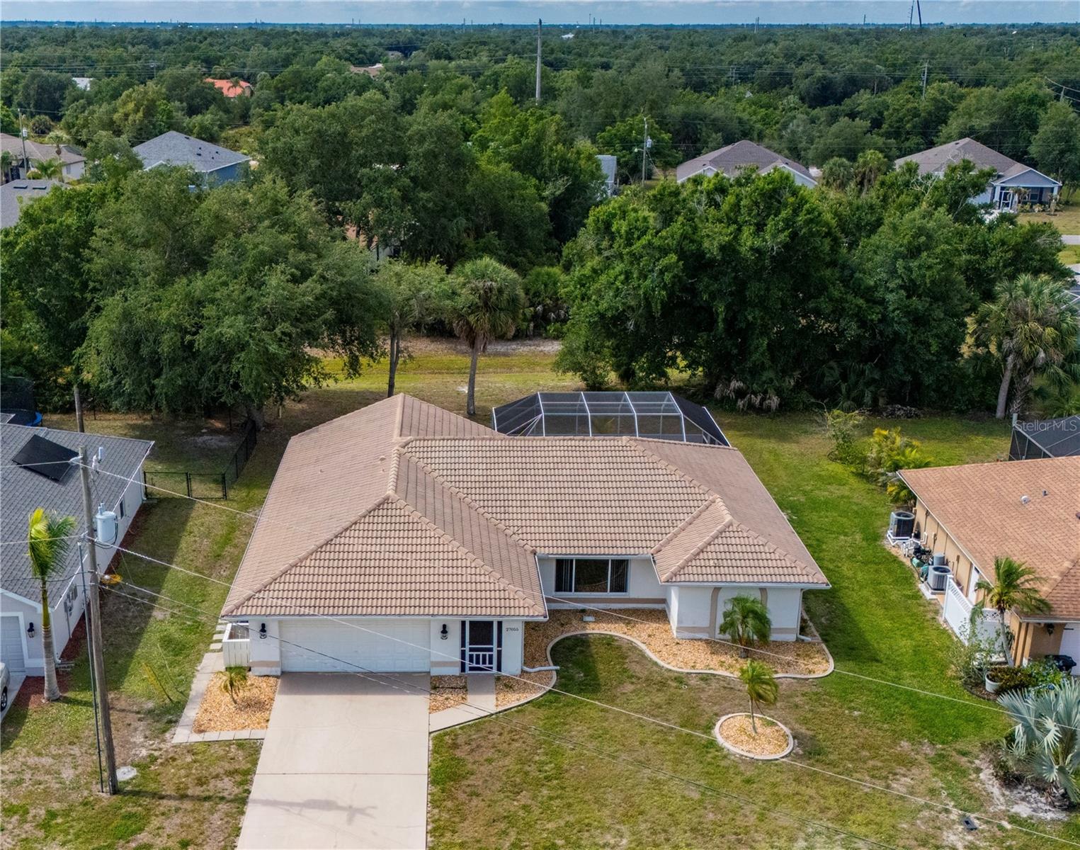 Single Family Residence em PUNTA GORDA, FL - Daniel Dourado