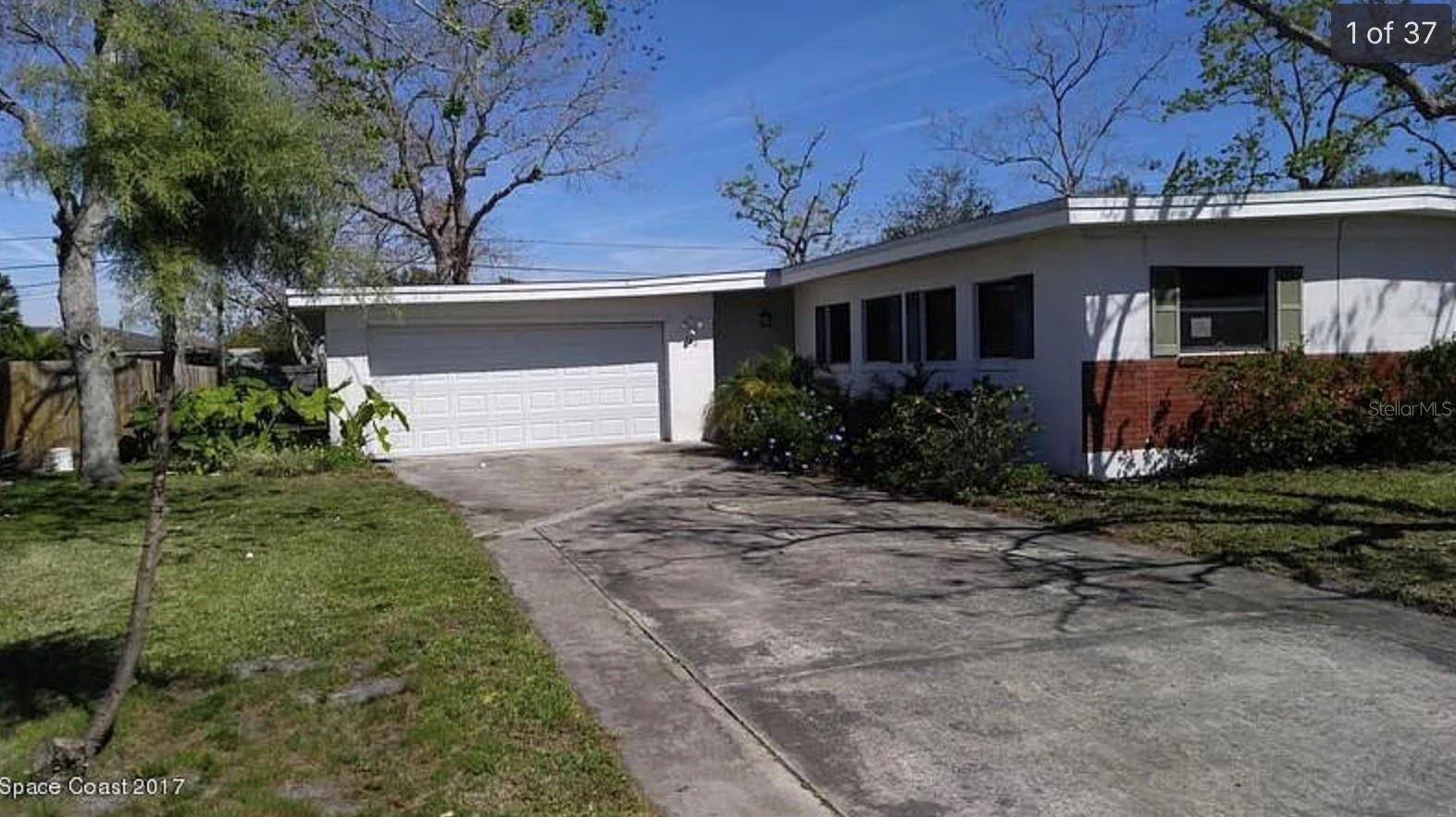 Single Family Residence em TITUSVILLE, FL - Daniel Dourado