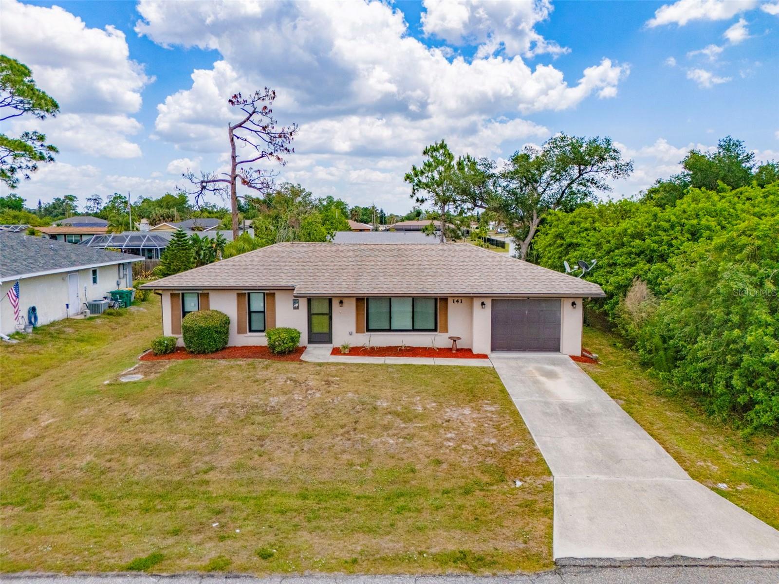Single Family Residence in PORT CHARLOTTE, FL - Daniel Dourado