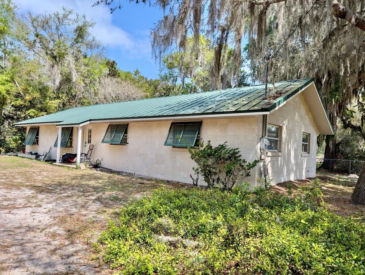 Single Family Residence em SALT SPRINGS, FL - Daniel Dourado