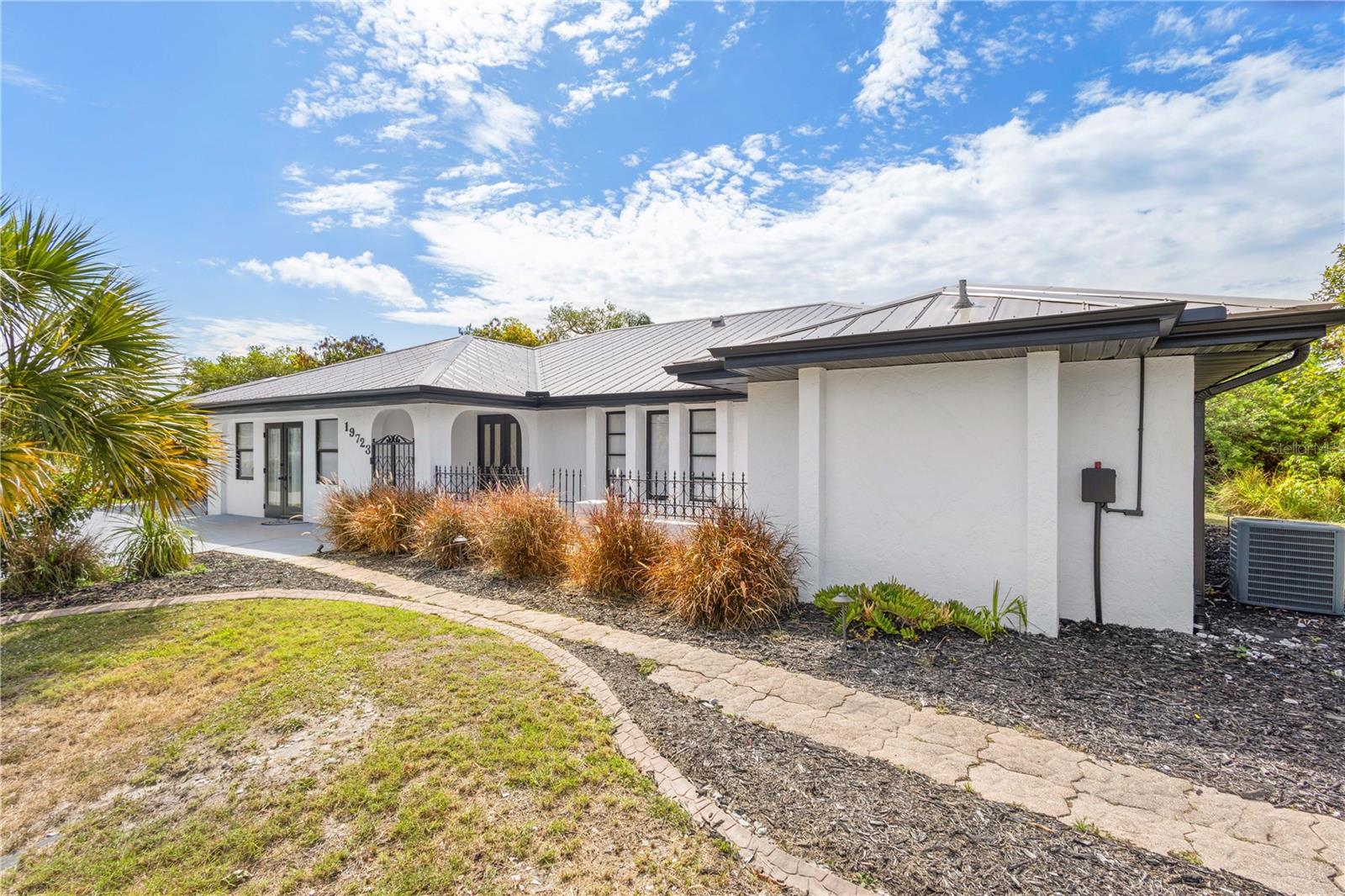 Single Family Residence in PORT CHARLOTTE, FL - Daniel Dourado