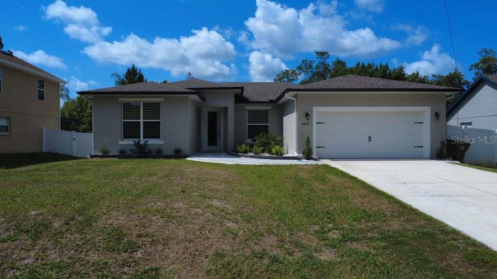 Single Family Residence em ST CLOUD, FL - Daniel Dourado