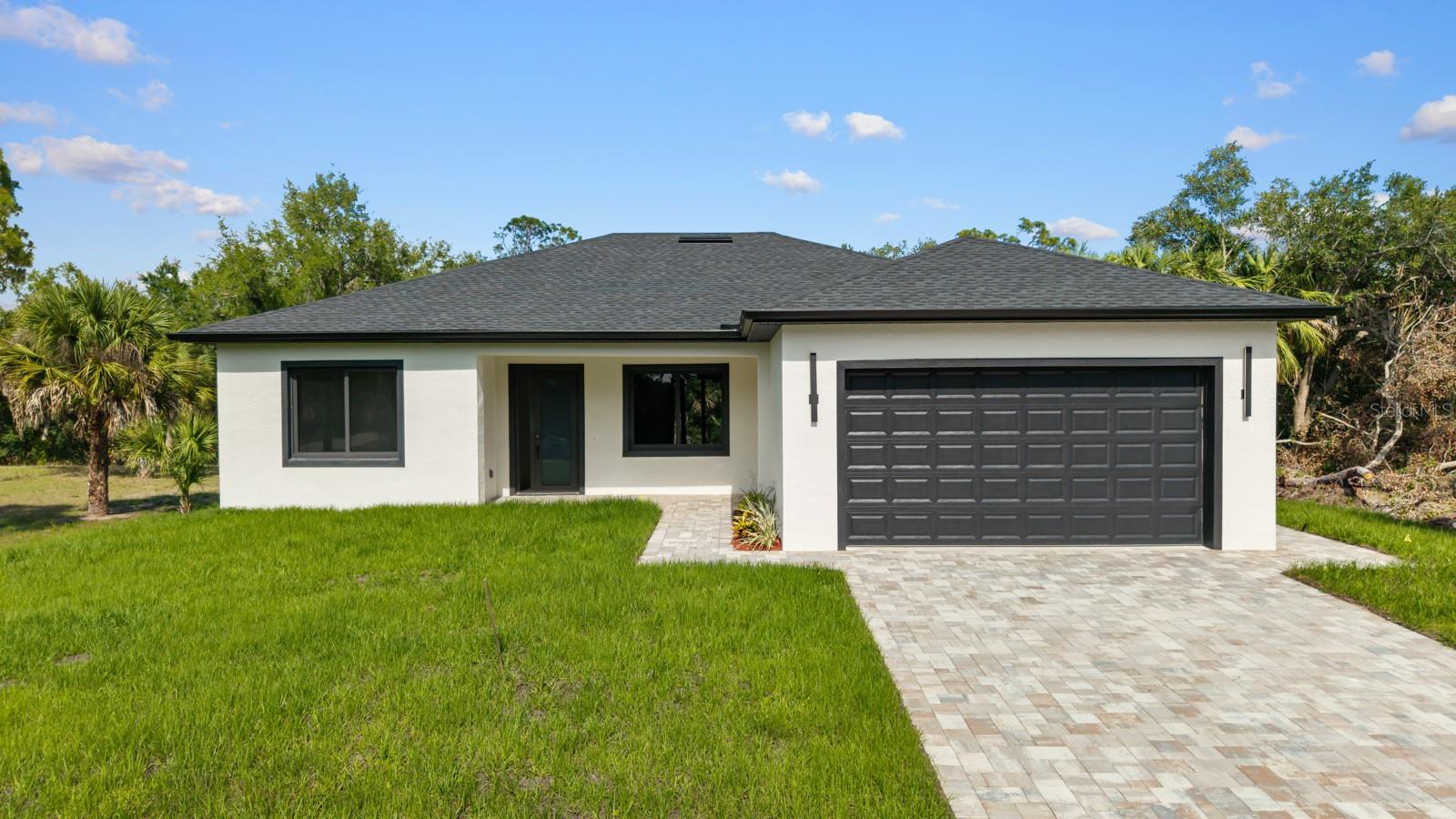 Single Family Residence in PORT CHARLOTTE, FL - Daniel Dourado