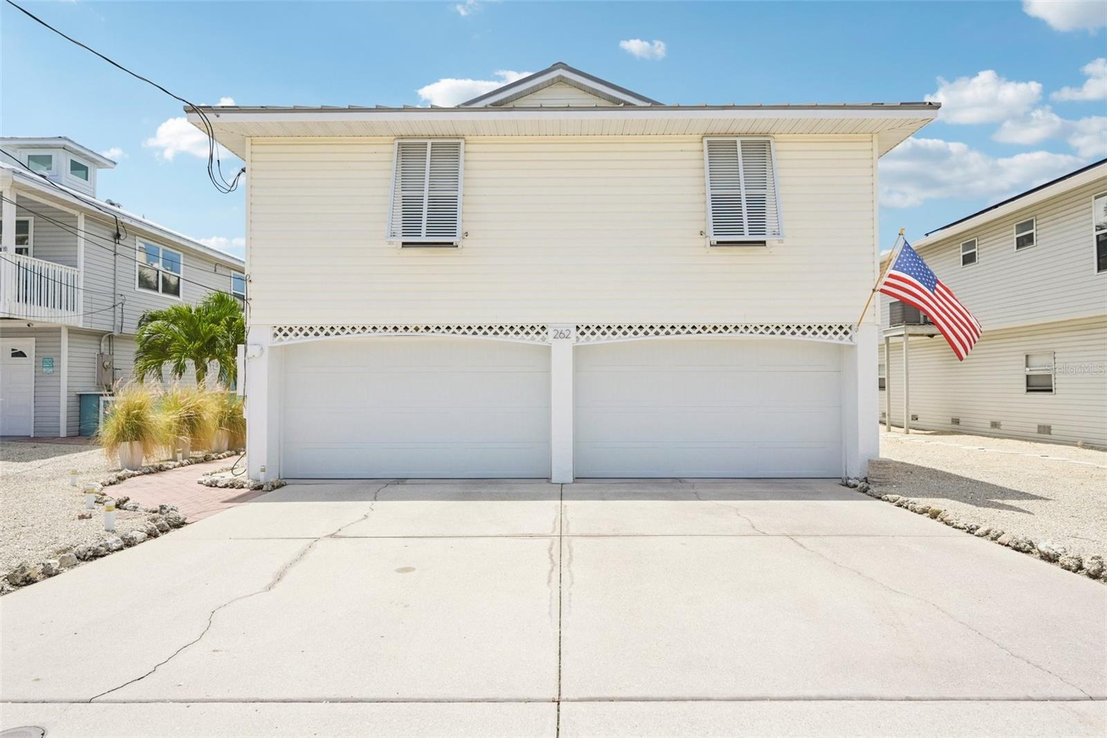 Single Family Residence em HOLMES BEACH, FL - Daniel Dourado
