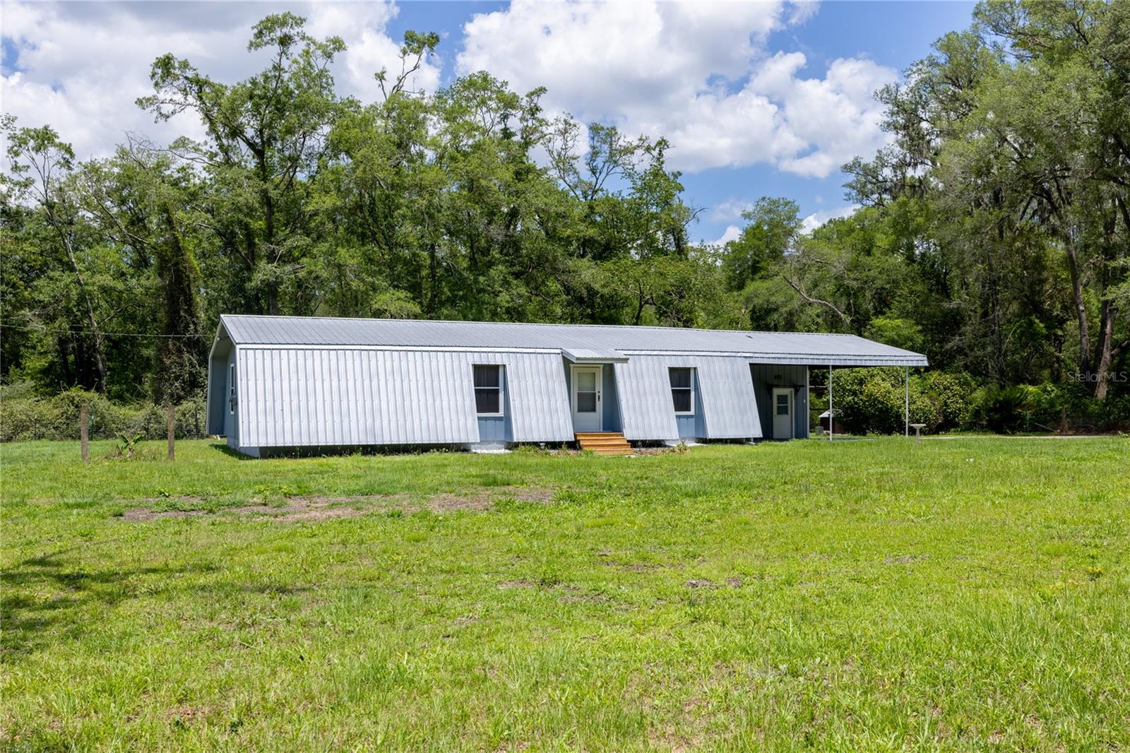 Single Family Residence em ALACHUA, FL - Daniel Dourado