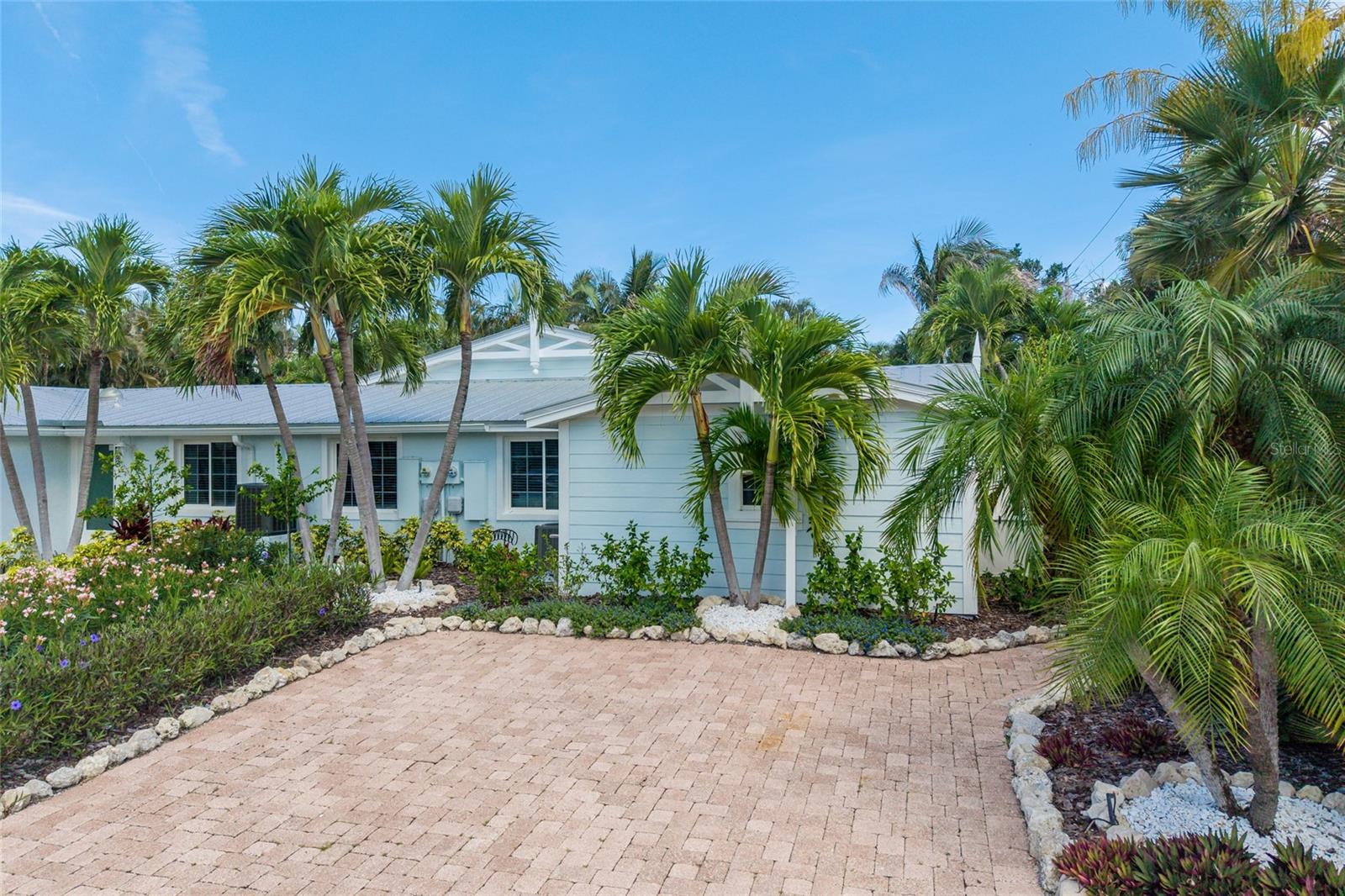 Single Family Residence em HOLMES BEACH, FL - Daniel Dourado