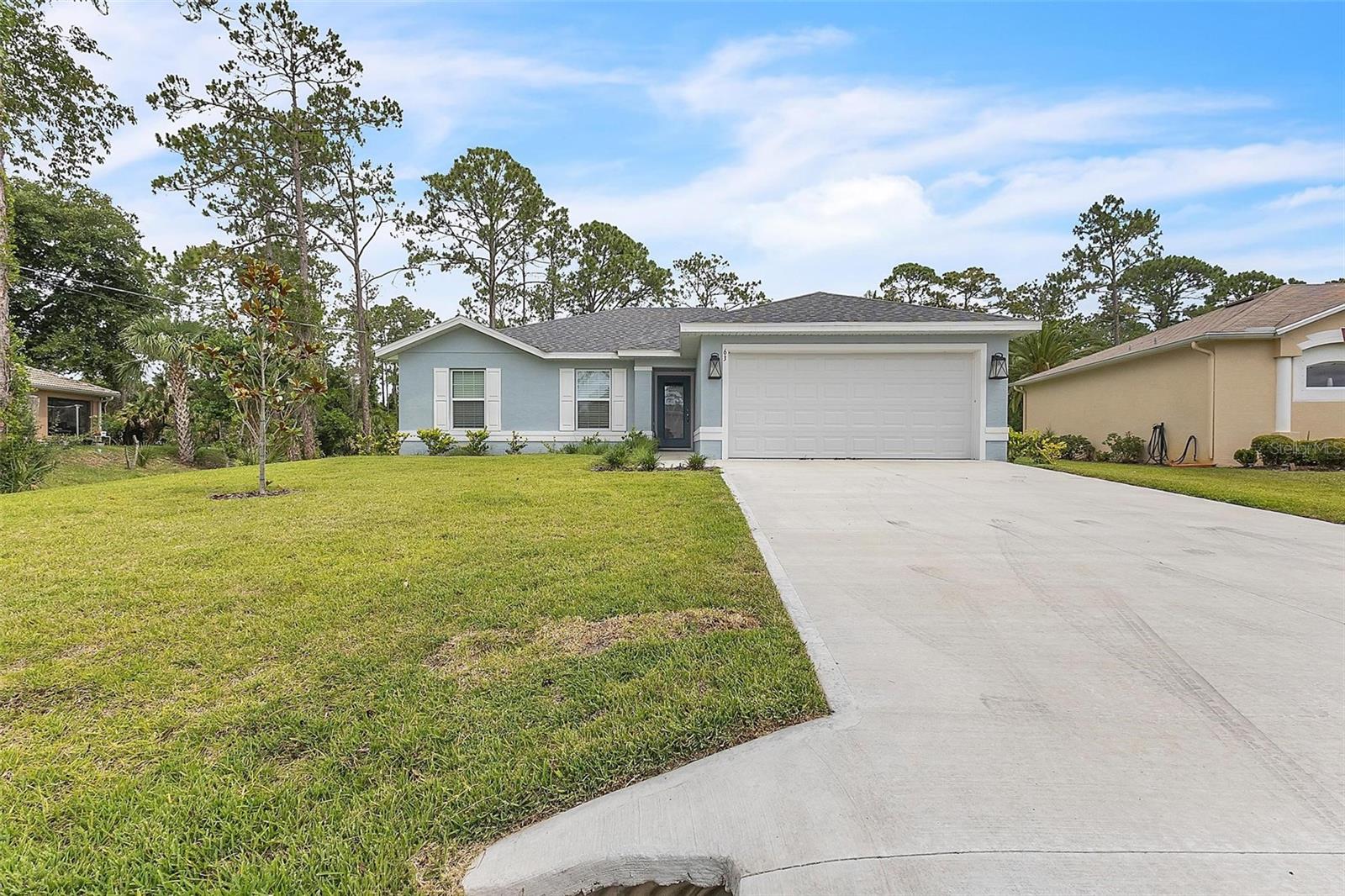 Single Family Residence in PALM COAST, FL - Daniel Dourado