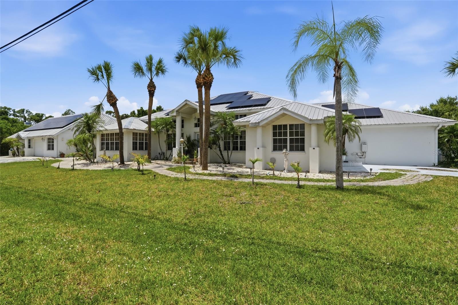 Single Family Residence in PUNTA GORDA, FL - Daniel Dourado