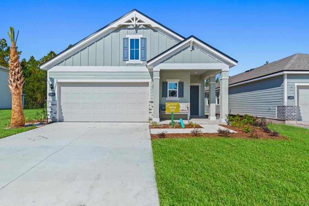 Single Family Residence in PALM COAST, FL - Daniel Dourado