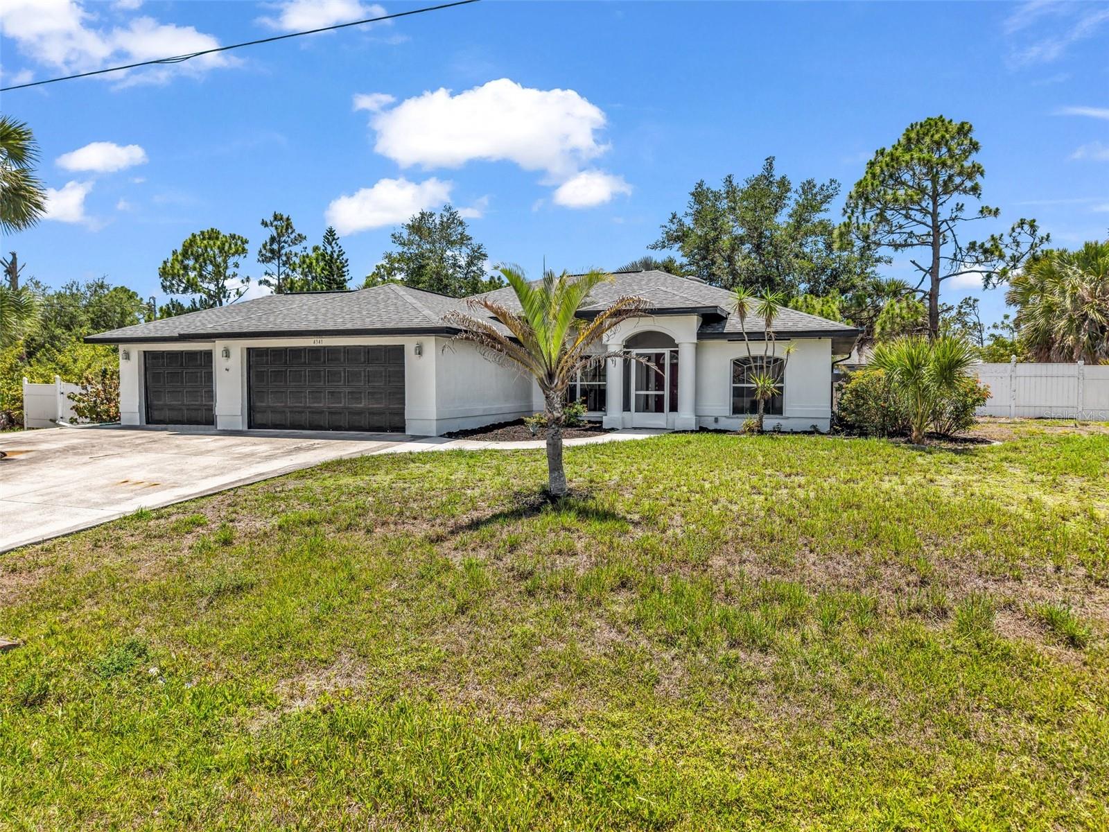 Single Family Residence in PORT CHARLOTTE, FL - Daniel Dourado