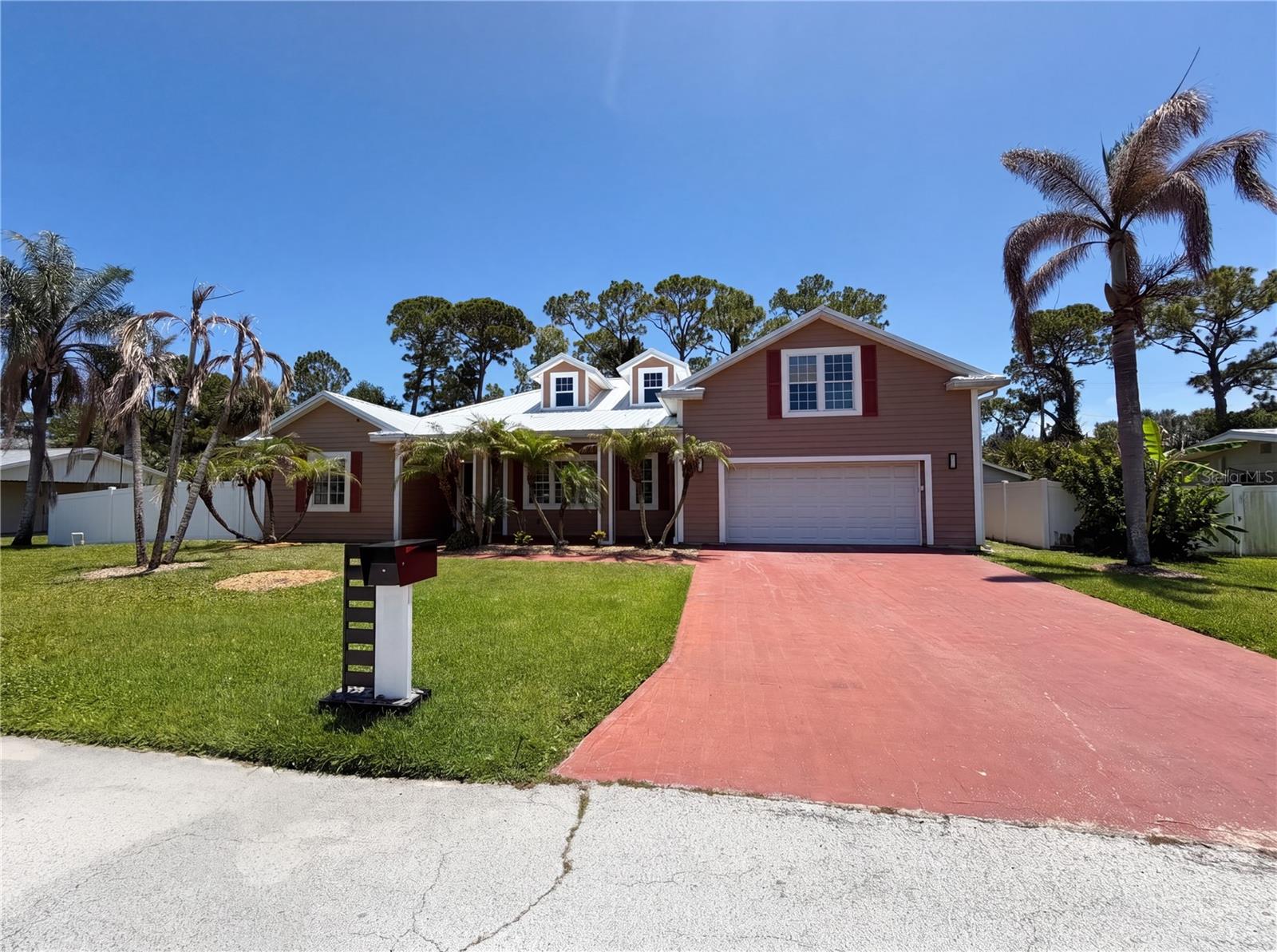 Single Family Residence in MERRITT ISLAND, FL - Daniel Dourado