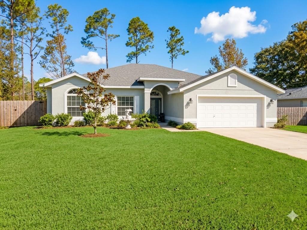 Single Family Residence in PALM COAST, FL - Daniel Dourado