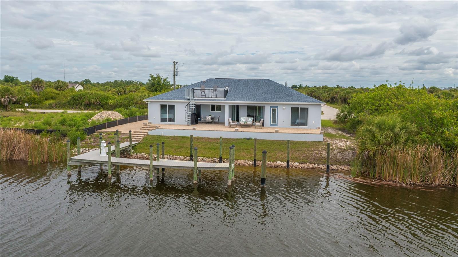 Single Family Residence in PORT CHARLOTTE, FL - Daniel Dourado