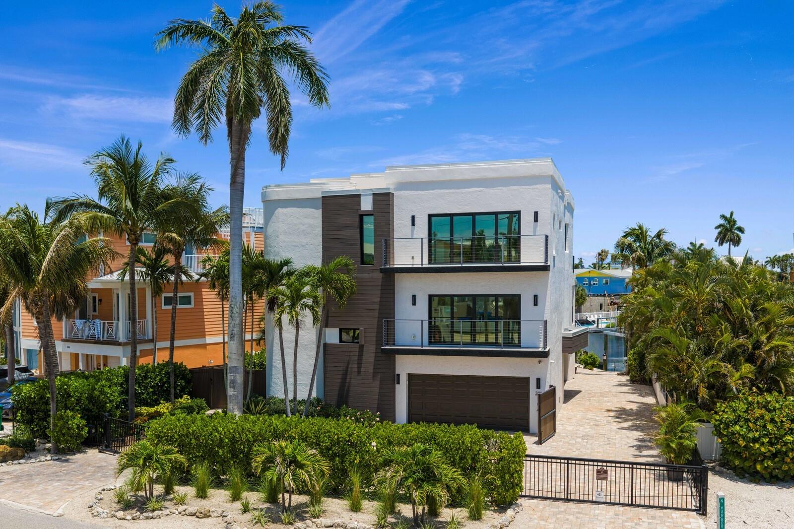 Single Family Residence em HOLMES BEACH, FL - Daniel Dourado