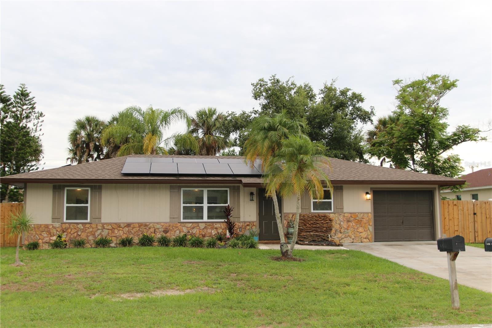 Single Family Residence in PORT CHARLOTTE, FL - Daniel Dourado