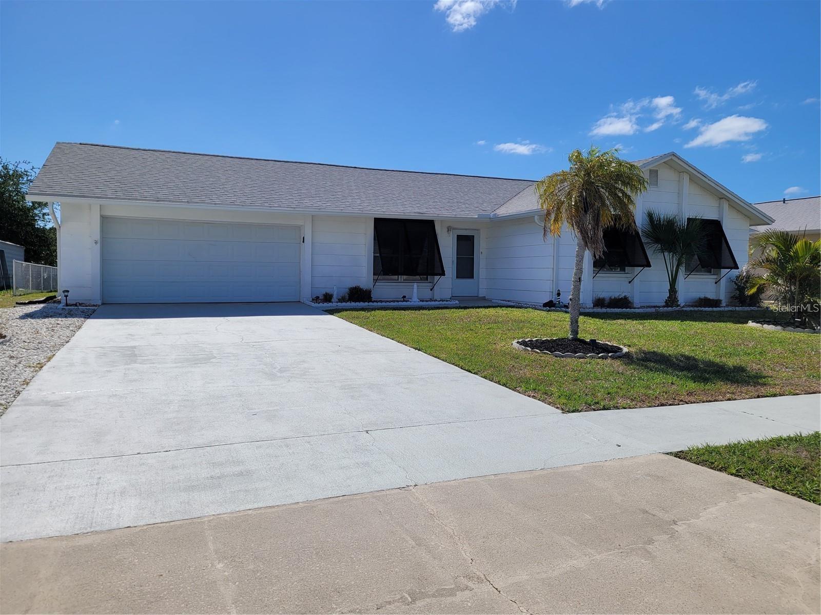 Single Family Residence in PORT CHARLOTTE, FL - Daniel Dourado